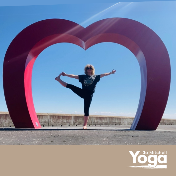 Jo Mitchell in uthita hasta pandangustasana at the Kirkcaldy Heart on Kirkcaldy Prom